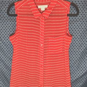 Liz Claiborne - Sleeveless polyester blouse. Red with tiny white stars. Size- M